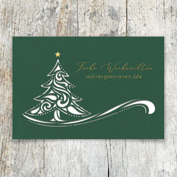 Grüne Weihnachtskarten mit goldener Prägung und Weihnachtsbaum mit Lasercut.
