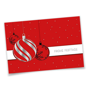 Rote Weihnachtskarten mit weißer Banderole und silbernen Prägungen.