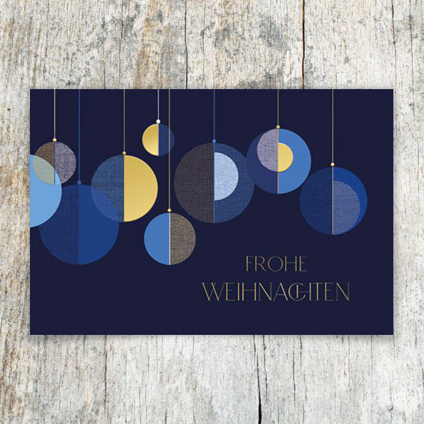 Blaue Weihnachtskarten mit silbernem und goldenen Foliendruck.