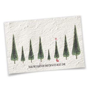 Weiße Weihnachtskarten mit grünen Aquarell-Weihnachtsbäumen und roten Akzenten.